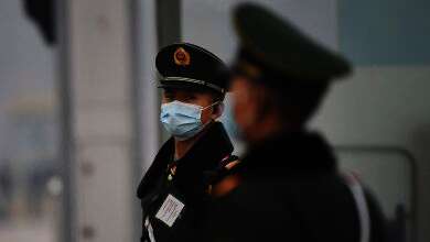 two arrested operating secret chinese police station